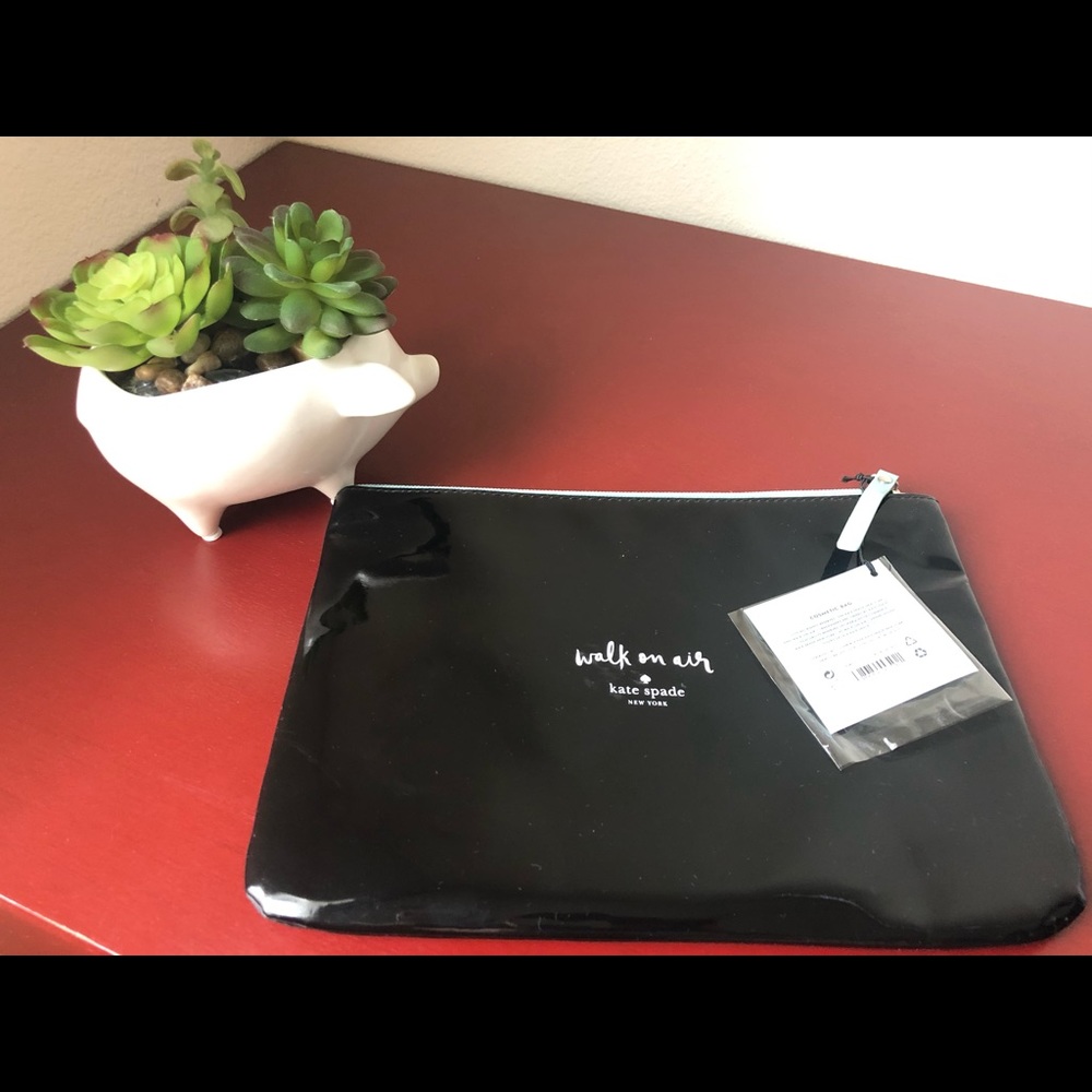 Brand new Kate spade cosmetic pouch/wallet